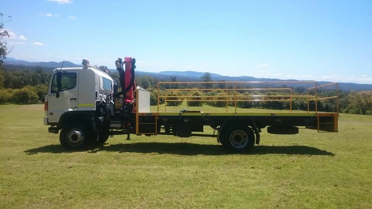 Sun Coast Forestry Mulching crane truck and tipper